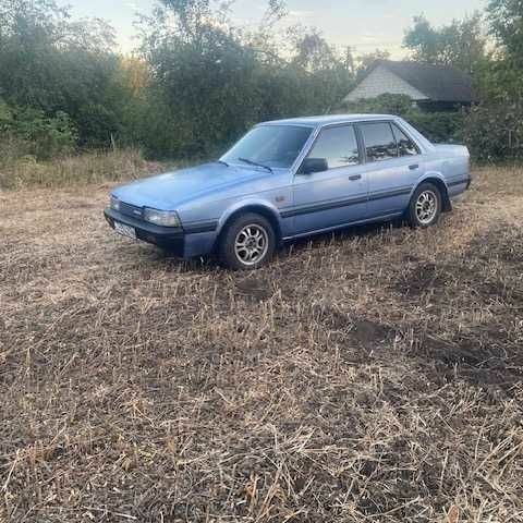 Синій Мазда 626, об'ємом двигуна 2 л та пробігом 270 тис. км за 916 $, фото 1 на Automoto.ua