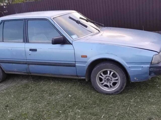 Синий Мазда 626, объемом двигателя 2 л и пробегом 405 тыс. км за 850 $, фото 1 на Automoto.ua