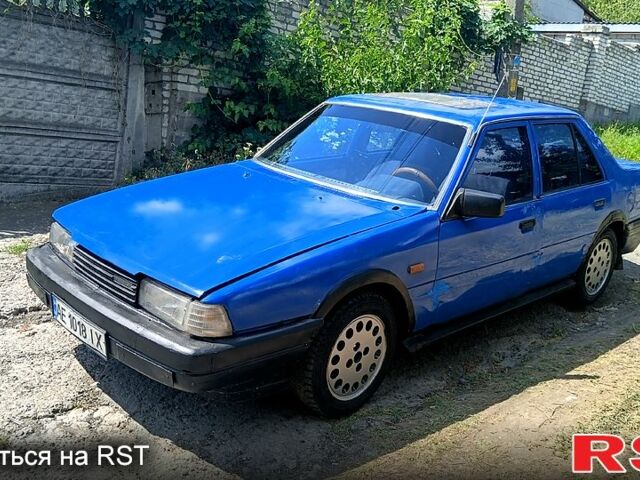 Синій Мазда 626, об'ємом двигуна 2 л та пробігом 155 тис. км за 470 $, фото 1 на Automoto.ua