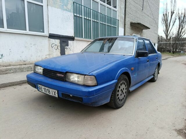 Синий Мазда 626, объемом двигателя 2 л и пробегом 500 тыс. км за 450 $, фото 1 на Automoto.ua