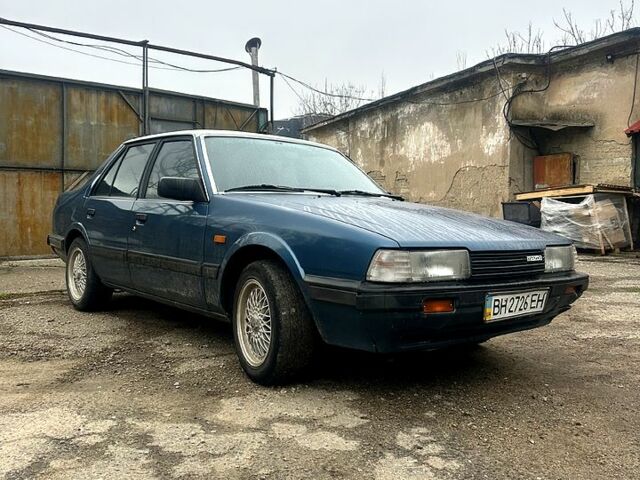 Синий Мазда 626, объемом двигателя 2 л и пробегом 230 тыс. км за 1700 $, фото 1 на Automoto.ua