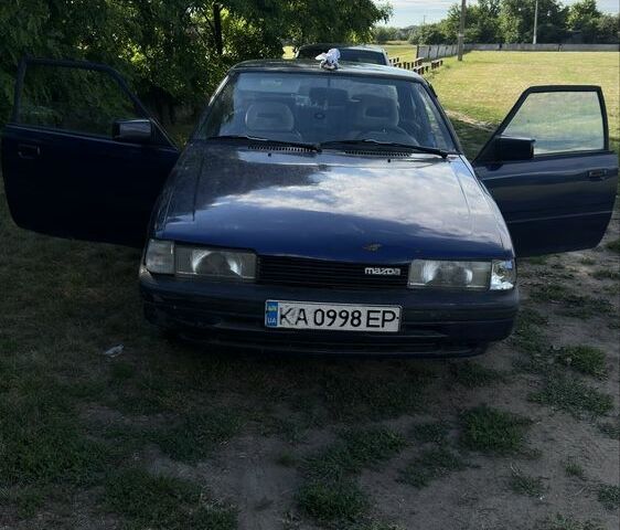 Синій Мазда 626, об'ємом двигуна 2 л та пробігом 1 тис. км за 449 $, фото 1 на Automoto.ua