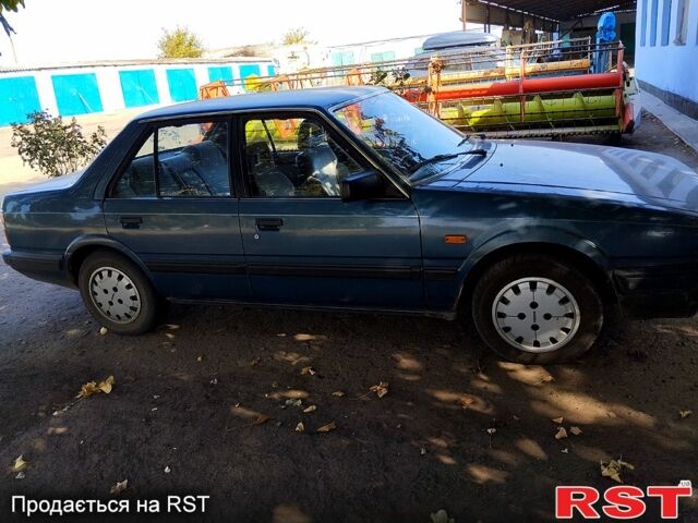 Синий Мазда 626, объемом двигателя 2 л и пробегом 190 тыс. км за 2000 $, фото 1 на Automoto.ua