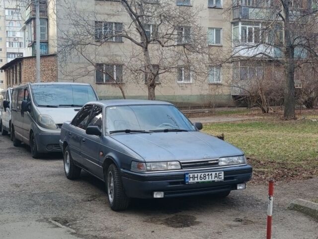 Синий Мазда 626, объемом двигателя 2 л и пробегом 300 тыс. км за 1296 $, фото 1 на Automoto.ua