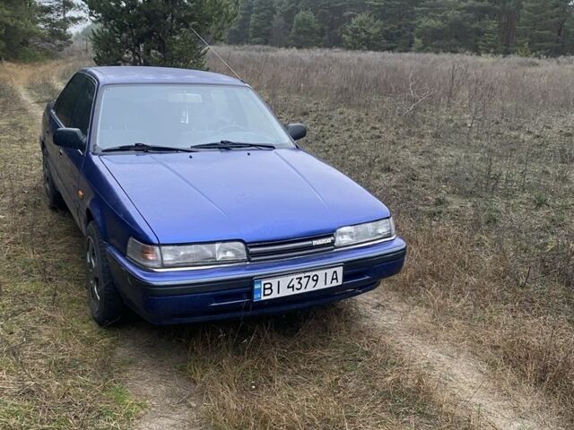 Синий Мазда 626, объемом двигателя 2.2 л и пробегом 335 тыс. км за 1650 $, фото 1 на Automoto.ua