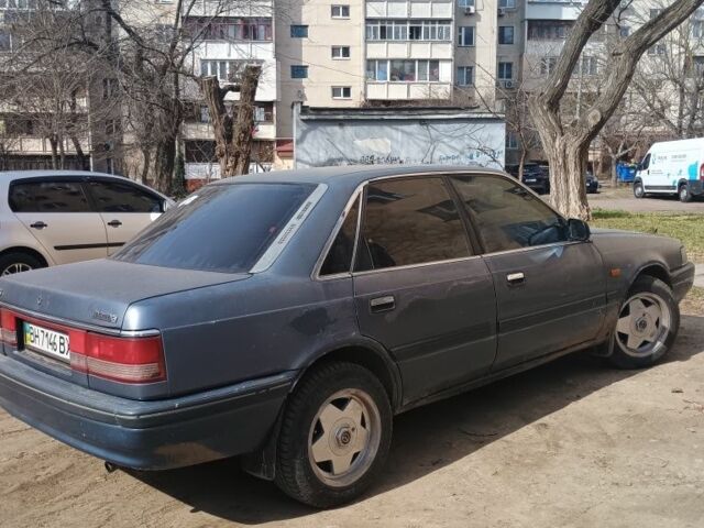 Синій Мазда 626, об'ємом двигуна 2 л та пробігом 2 тис. км за 1306 $, фото 1 на Automoto.ua