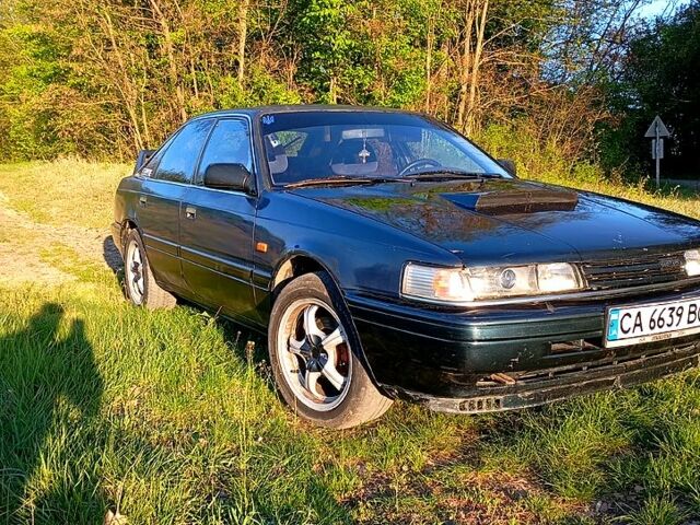 Синий Мазда 626, объемом двигателя 2 л и пробегом 350 тыс. км за 1200 $, фото 1 на Automoto.ua