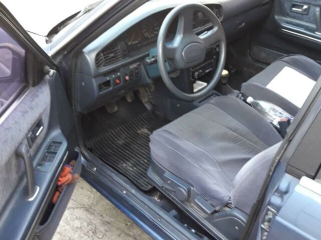 Синий Мазда 626, объемом двигателя 2 л и пробегом 355 тыс. км за 2200 $, фото 1 на Automoto.ua