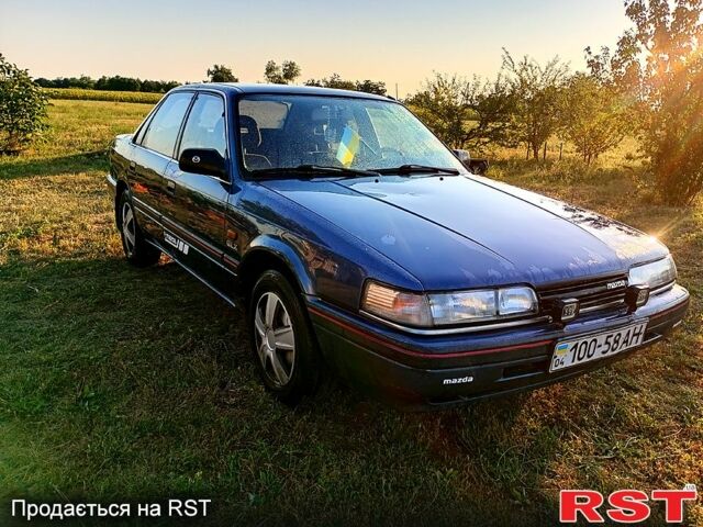 Синій Мазда 626, об'ємом двигуна 2 л та пробігом 200 тис. км за 800 $, фото 1 на Automoto.ua