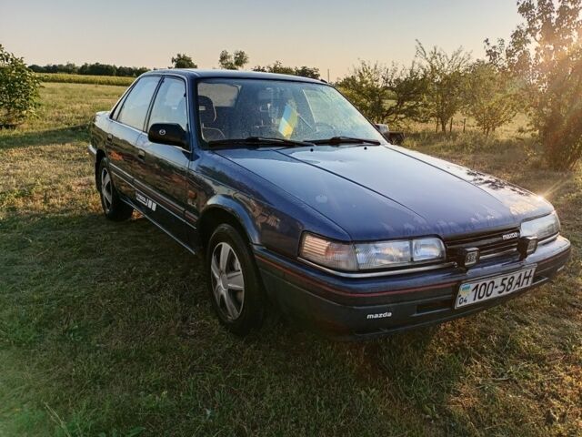 Синий Мазда 626, объемом двигателя 2 л и пробегом 200 тыс. км за 783 $, фото 1 на Automoto.ua