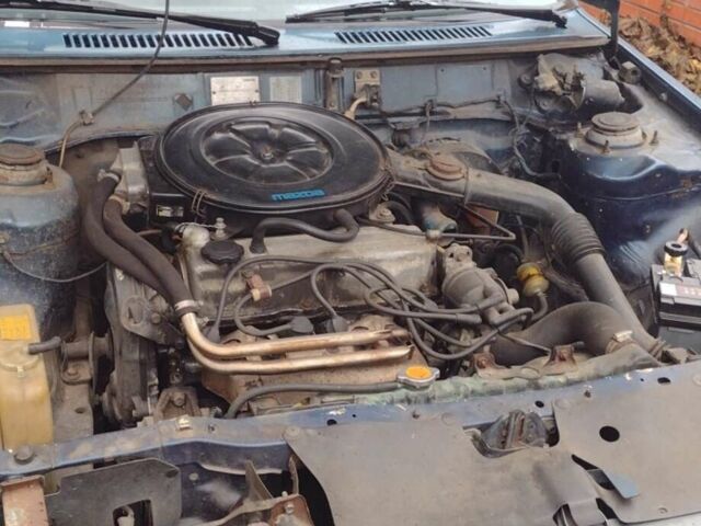 Синій Мазда 626, об'ємом двигуна 2 л та пробігом 359 тис. км за 1000 $, фото 1 на Automoto.ua