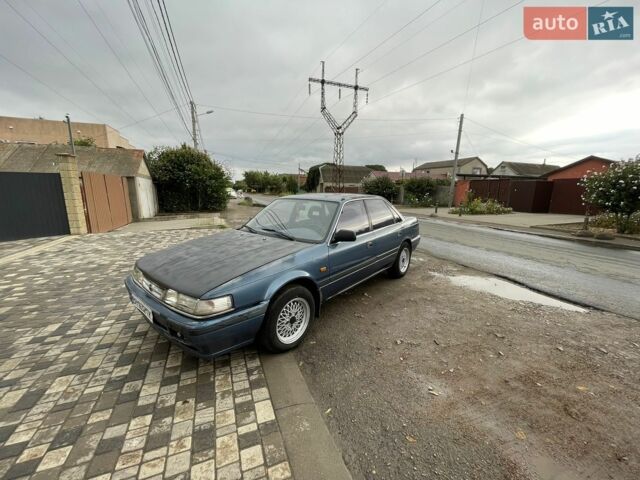 Синий Мазда 626, объемом двигателя 2 л и пробегом 385 тыс. км за 1000 $, фото 1 на Automoto.ua