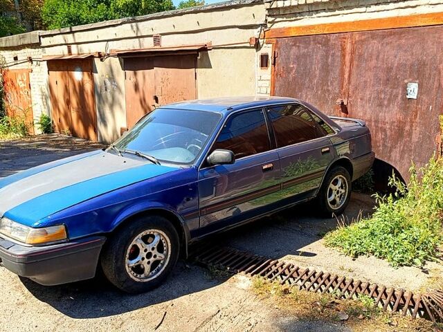 Синий Мазда 626, объемом двигателя 1.8 л и пробегом 1000 тыс. км за 950 $, фото 1 на Automoto.ua