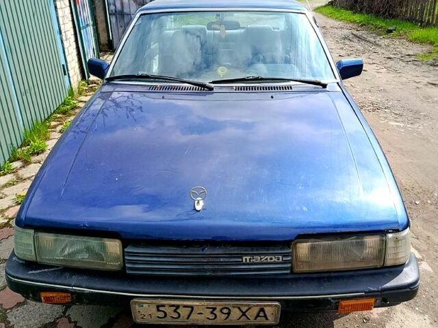 Синій Мазда 626, об'ємом двигуна 2 л та пробігом 300 тис. км за 550 $, фото 1 на Automoto.ua