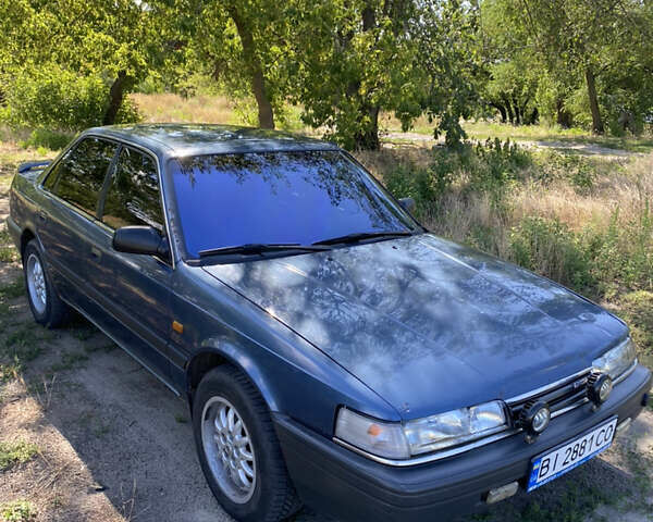 Синий Мазда 626, объемом двигателя 2 л и пробегом 333 тыс. км за 1400 $, фото 1 на Automoto.ua