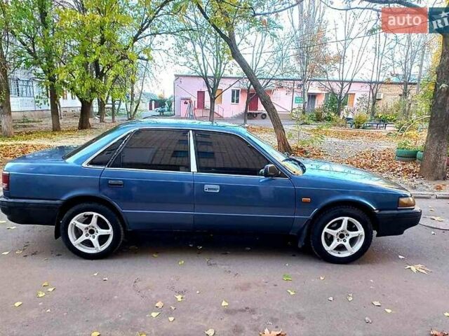 Синій Мазда 626, об'ємом двигуна 2 л та пробігом 128 тис. км за 2000 $, фото 1 на Automoto.ua