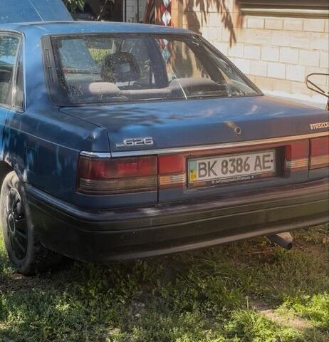 Синій Мазда 626, об'ємом двигуна 2 л та пробігом 100 тис. км за 259 $, фото 1 на Automoto.ua
