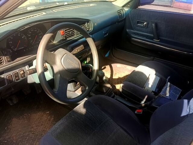 Синий Мазда 626, объемом двигателя 2 л и пробегом 380 тыс. км за 850 $, фото 1 на Automoto.ua