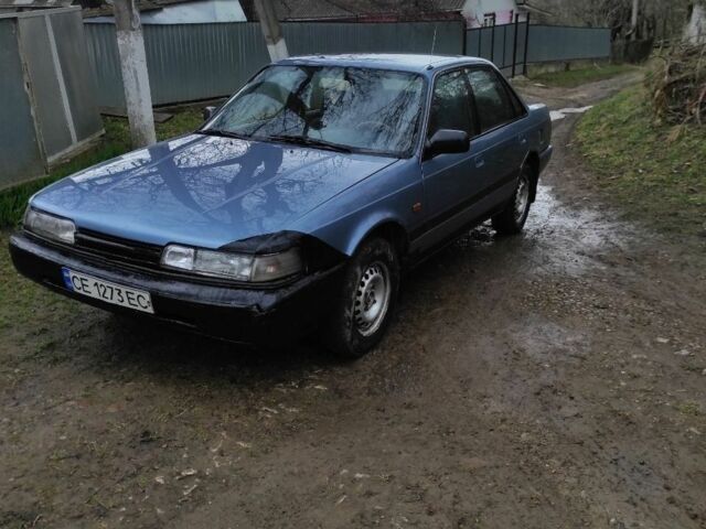 Синій Мазда 626, об'ємом двигуна 1.8 л та пробігом 127 тис. км за 650 $, фото 1 на Automoto.ua