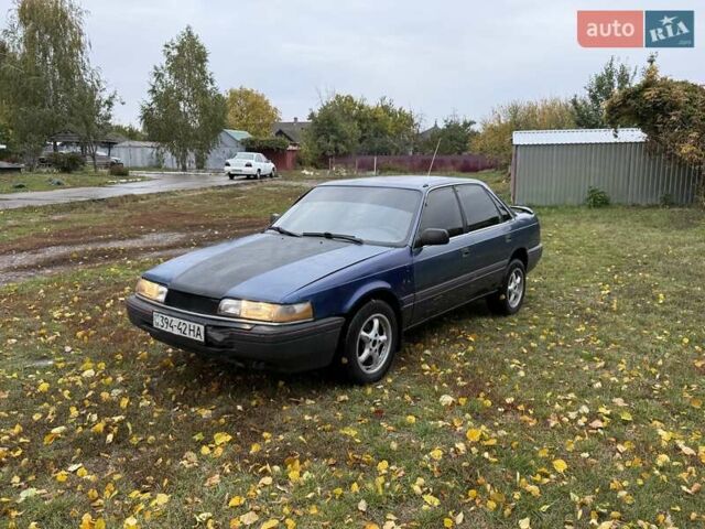 Синій Мазда 626, об'ємом двигуна 1.8 л та пробігом 90 тис. км за 850 $, фото 1 на Automoto.ua
