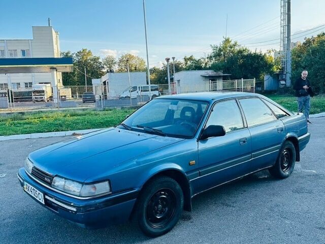 Синий Мазда 626, объемом двигателя 2 л и пробегом 400 тыс. км за 750 $, фото 1 на Automoto.ua
