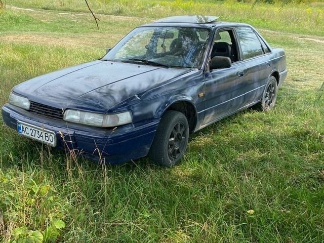 Синий Мазда 626, объемом двигателя 2 л и пробегом 200 тыс. км за 289 $, фото 1 на Automoto.ua