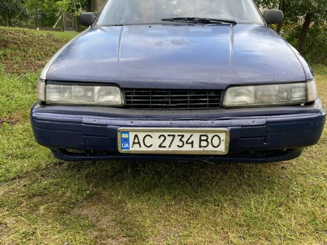 Синий Мазда 626, объемом двигателя 2 л и пробегом 1 тыс. км за 650 $, фото 1 на Automoto.ua