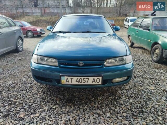 Синий Мазда 626, объемом двигателя 2 л и пробегом 310 тыс. км за 2000 $, фото 1 на Automoto.ua