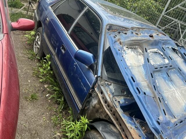 Синий Мазда 626, объемом двигателя 2 л и пробегом 300 тыс. км за 350 $, фото 1 на Automoto.ua