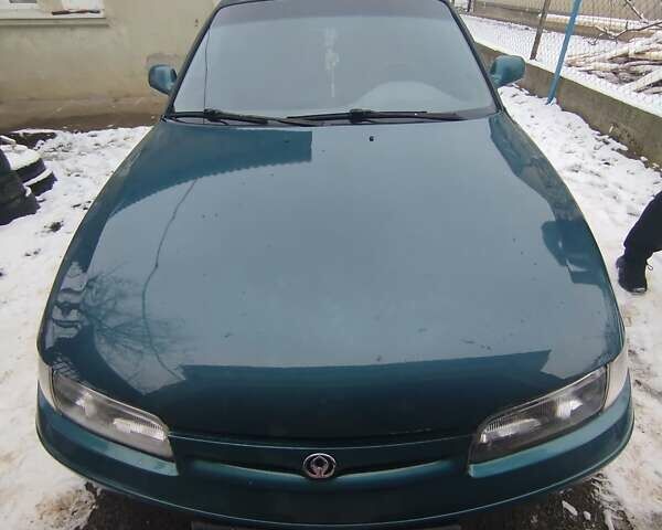 Синий Мазда 626, объемом двигателя 2 л и пробегом 310 тыс. км за 2300 $, фото 1 на Automoto.ua