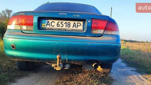 Синий Мазда 626, объемом двигателя 2 л и пробегом 442 тыс. км за 600 $, фото 1 на Automoto.ua