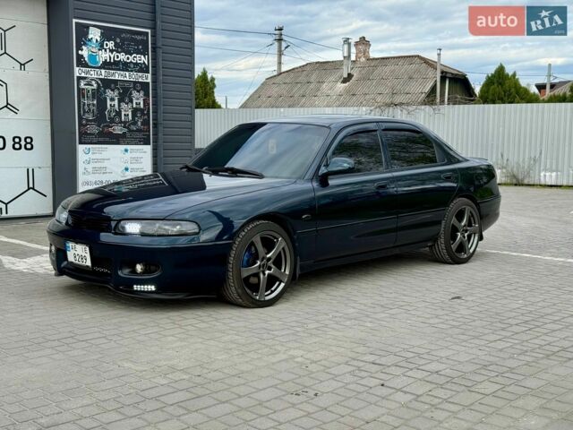 Синий Мазда 626, объемом двигателя 2 л и пробегом 320 тыс. км за 3800 $, фото 1 на Automoto.ua