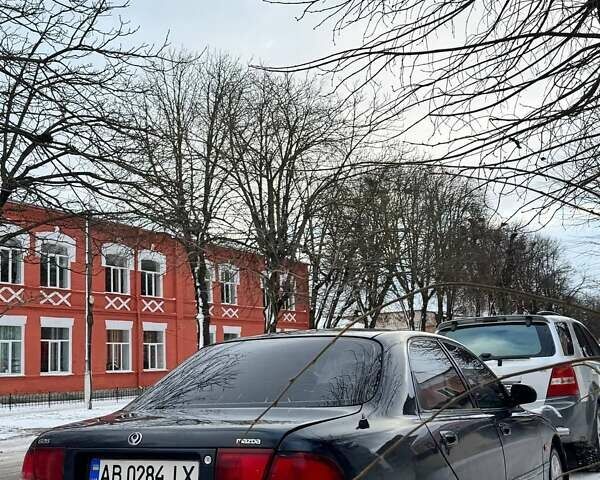 Синій Мазда 626, об'ємом двигуна 2 л та пробігом 515 тис. км за 2400 $, фото 1 на Automoto.ua