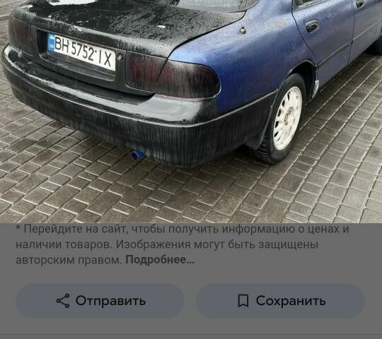 Синий Мазда 626, объемом двигателя 2 л и пробегом 400 тыс. км за 671 $, фото 1 на Automoto.ua