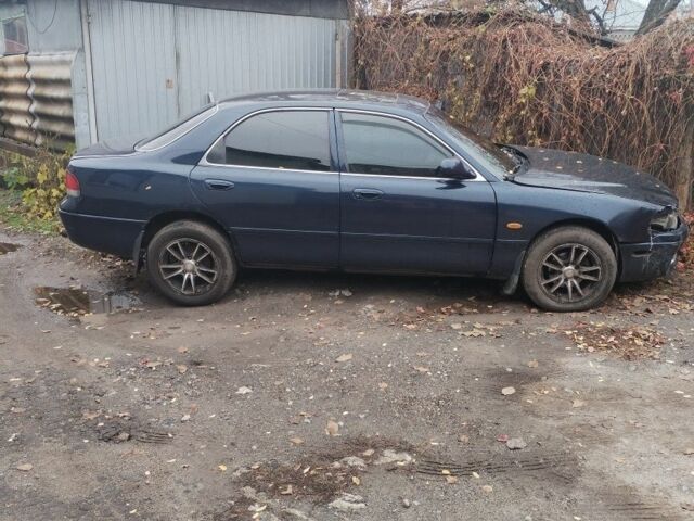 Синий Мазда 626, объемом двигателя 2 л и пробегом 400 тыс. км за 952 $, фото 1 на Automoto.ua