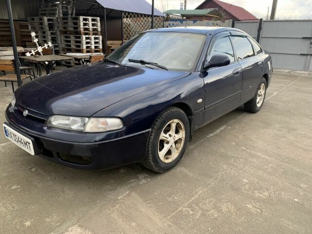 Синий Мазда 626, объемом двигателя 1.8 л и пробегом 200 тыс. км за 1200 $, фото 1 на Automoto.ua