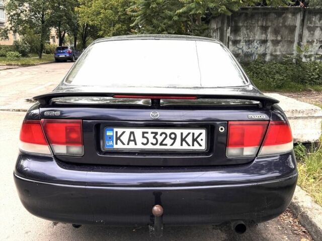 Синий Мазда 626, объемом двигателя 1.8 л и пробегом 460 тыс. км за 1199 $, фото 1 на Automoto.ua