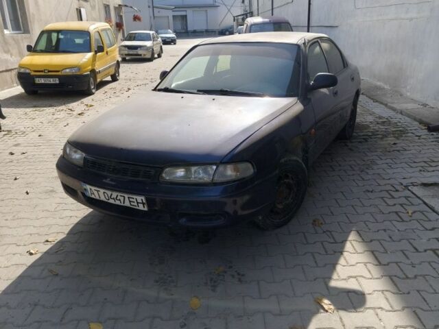 Синий Мазда 626, объемом двигателя 1.8 л и пробегом 450 тыс. км за 1118 $, фото 1 на Automoto.ua