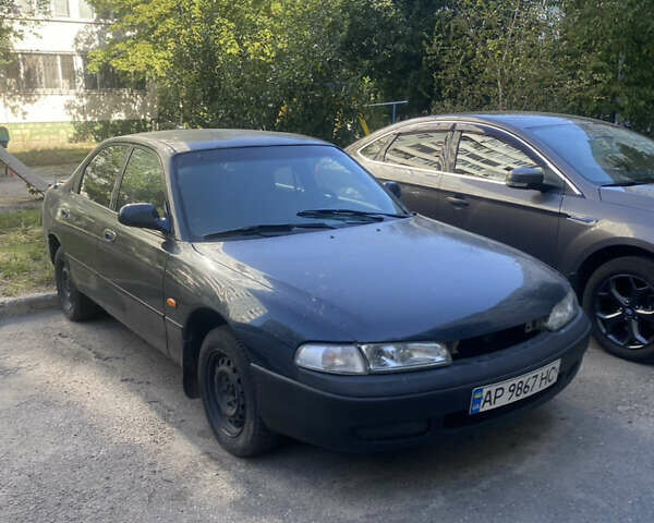 Синий Мазда 626, объемом двигателя 2 л и пробегом 500 тыс. км за 1300 $, фото 1 на Automoto.ua