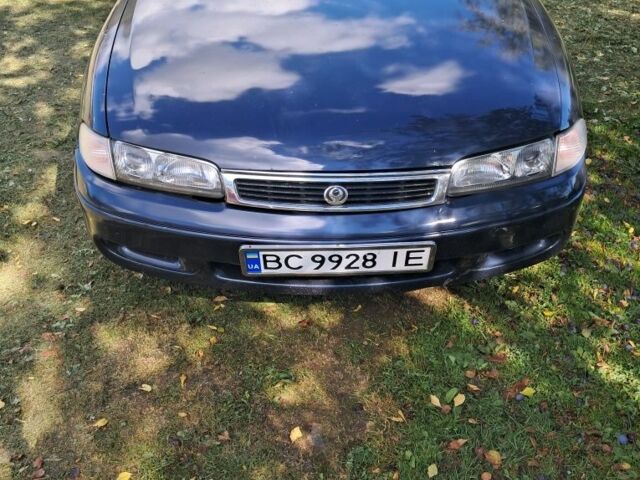 Синий Мазда 626, объемом двигателя 1.8 л и пробегом 259 тыс. км за 954 $, фото 1 на Automoto.ua