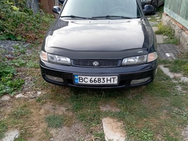 Синий Мазда 626, объемом двигателя 2 л и пробегом 450 тыс. км за 2500 $, фото 1 на Automoto.ua