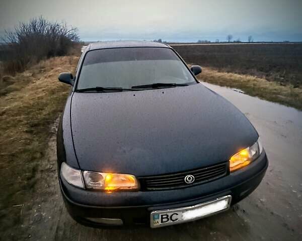 Синій Мазда 626, об'ємом двигуна 2 л та пробігом 444 тис. км за 2405 $, фото 1 на Automoto.ua