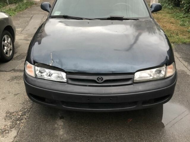 Синій Мазда 626, об'ємом двигуна 2 л та пробігом 390 тис. км за 1500 $, фото 1 на Automoto.ua