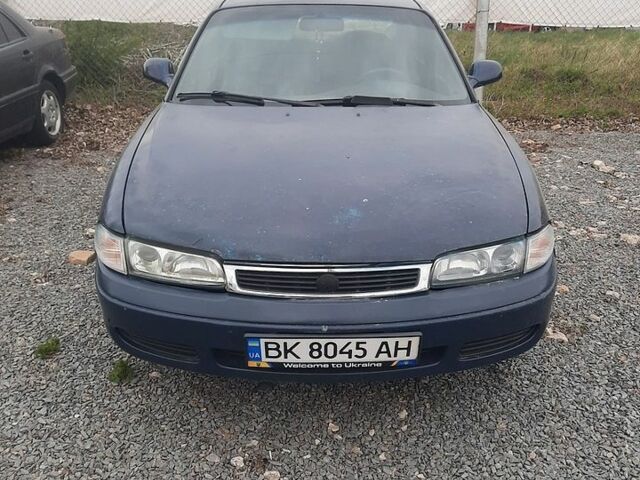 Синий Мазда 626, объемом двигателя 1.8 л и пробегом 290 тыс. км за 1950 $, фото 1 на Automoto.ua