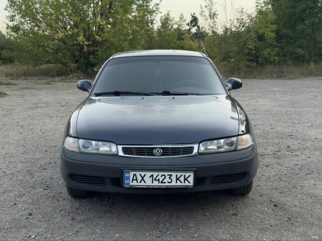 Синий Мазда 626, объемом двигателя 2 л и пробегом 400 тыс. км за 1400 $, фото 1 на Automoto.ua
