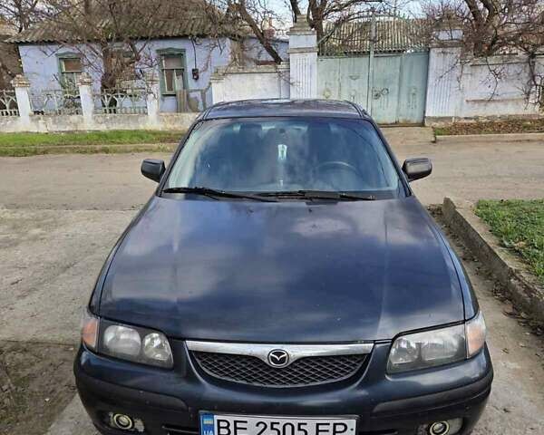 Синий Мазда 626, объемом двигателя 2 л и пробегом 305 тыс. км за 2300 $, фото 1 на Automoto.ua