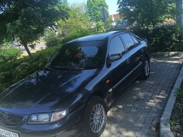 Синій Мазда 626, об'ємом двигуна 2 л та пробігом 330 тис. км за 3000 $, фото 1 на Automoto.ua