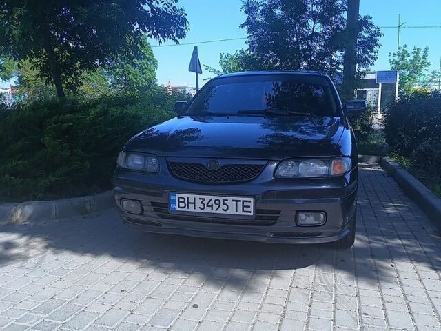 Синій Мазда 626, об'ємом двигуна 2 л та пробігом 330 тис. км за 3000 $, фото 1 на Automoto.ua