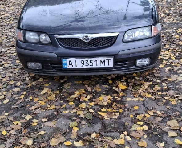 Синий Мазда 626, объемом двигателя 1.8 л и пробегом 1000 тыс. км за 2800 $, фото 1 на Automoto.ua