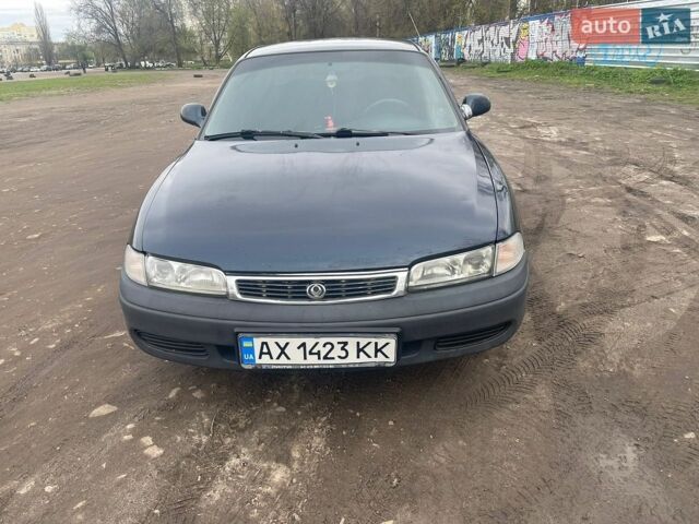 Синий Мазда 626, объемом двигателя 2 л и пробегом 432 тыс. км за 669 $, фото 1 на Automoto.ua